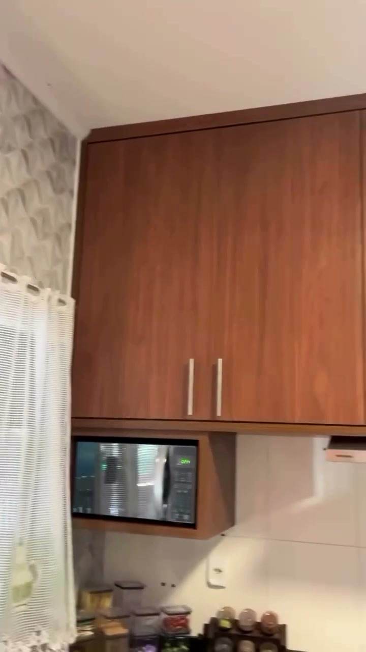 Detalhe do armazenamento na cozinha planejada
